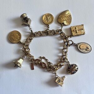 Monet gold tone vintage charm bracelet. Perfect condition.